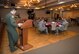 Capt. Daniel Hess, 310th Fighter Squadron, installation project officer, speaks to Thunderbolts during the Air Force Assistance Fund campaign kickoff breakfast at Luke Air Force Base, Ariz., April 2, 2018. The event officially kicked off the six-week campaign designed to assist Air Force personnel and their families. (U.S. Air Force photo by Airman 1st Class Alexander Cook)