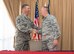 Chief Master Sgt. Randy Kwiatkowski, 56th Fighter Wing command chief, and Col. Robert Sylvester, 56th Mission Support Group commander, shake hands after signing the Air Force Assistance Fund donation forms during the AFAF campaign kickoff breakfast at Luke Air Force Base, Ariz., April 2, 2018. The event officially started the six-week campaign at Luke, designed to provide support to Air Force personnel and their families. (U.S. Air Force photo by Airman 1st Class Alexander Cook)