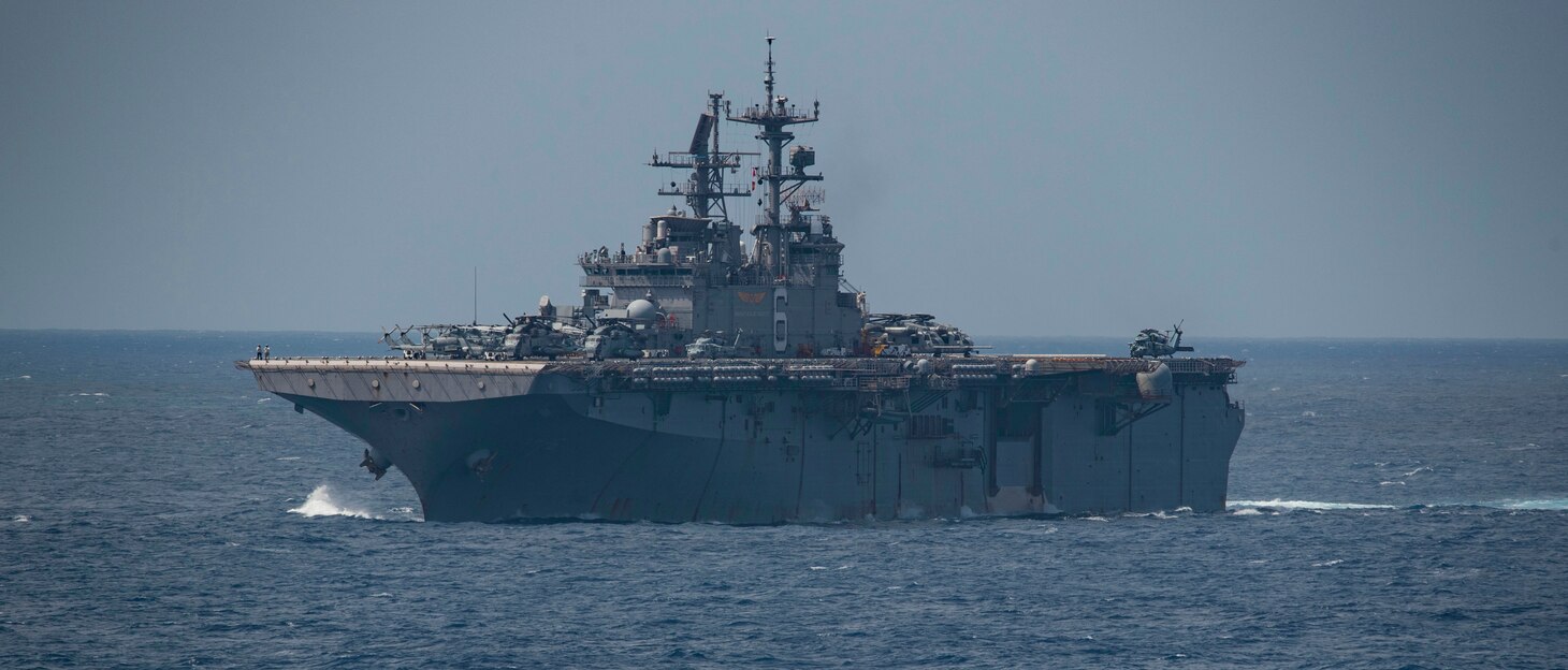 180329-N-BD308-0003 PHILIPPINE SEA (March 29, 2018) The Wasp-class amphibious assault ship USS Bonhomme Richard (LHD 6) transits the Philippine Sea prior to conducting a replenishment-at-sea with the fleet replenishment oiler USNS Tippecanoe (T-AO 199). Bonhomme Richard, along with the Wasp Expeditionary Strike Group, with embarked 31st Marine Expeditionary Unit, is operating in the Indo-Pacific region to enhance interoperability with partners, serve as a ready-response force for any type of contingency and advance the Up-Gunned ESG Concept. (U.S. Navy photo by Mass Communication Specialist 3rd Class Levingston Lewis/Released)