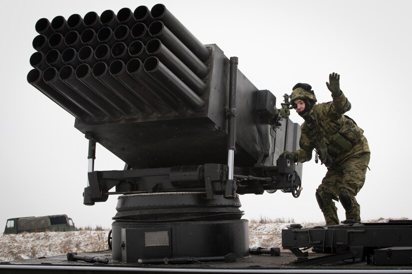 A Croatian artillery soldier assigned to the Volcano Battery aligns his team’s Vulkan M-92