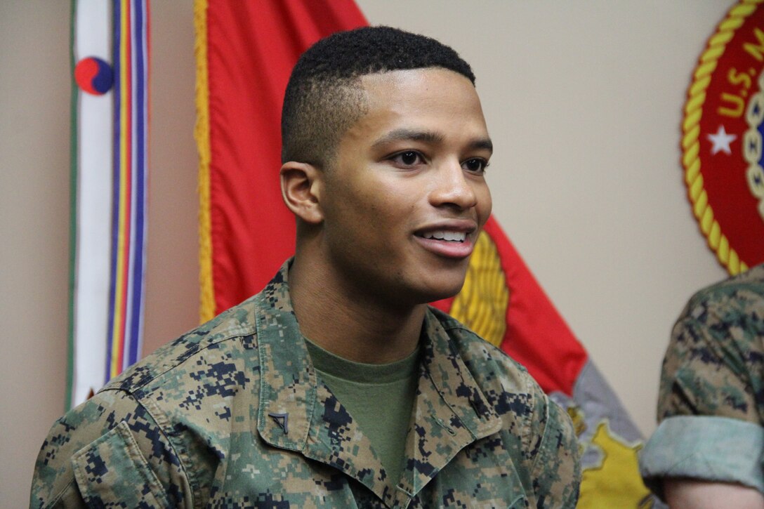 Lance Cpl. Elijah A. Williamson addresses the Marines of U.S. Marine Corps Forces Korea following his promotion here, April 2. Williamson, who works in the MARFORK G-5 Plans and Policy said having the whole command there for his promotion showed not only its significance but also made the event more meaningful for him. (Official U.S. Marine Corps photo by Sgt. Nathaniel Hanscom/Released)