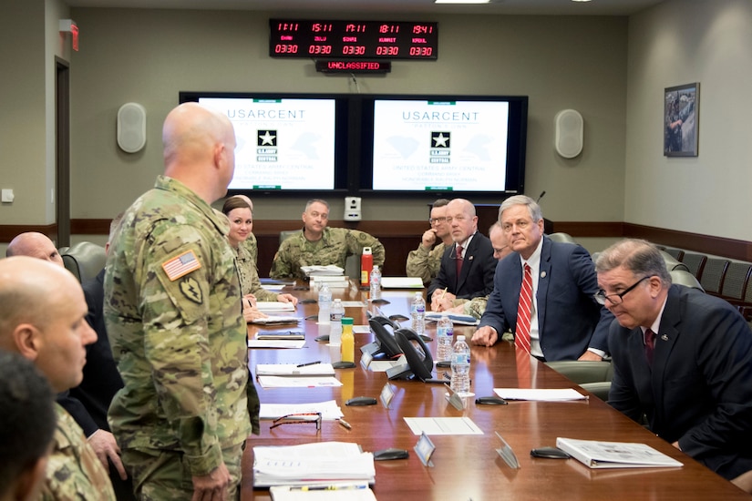 U.S. Congressman Ralph Norman meets USARCENT staff members during his briefing session as part of his visit to U.S. Army Central’s Patton Hall, March 30, 2018, . Norman took the opportunity of the visit to learn about USARCENT’s mission and challenges that the organization faces, such as ensuring security of strategic maritime points and issues Soldiers face at home.