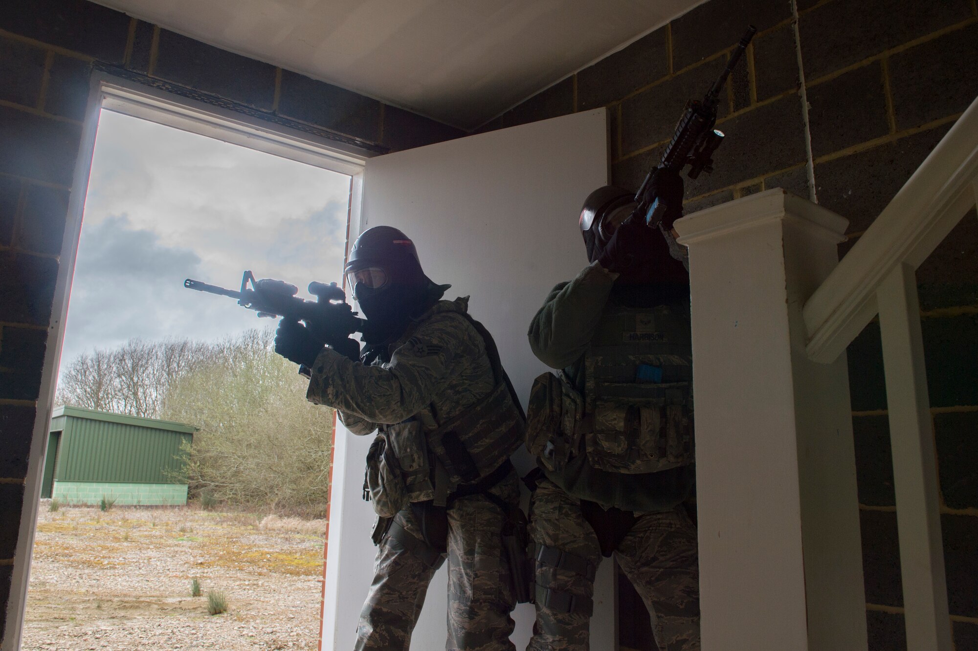 Airmen with the 422nd Security Forces Squadron participate in a force on force exercise at Bicester Garrison, United Kingdom, March 29, 2018. The urban warfare exercise was designed to enhance and sharpen Airmen’s house clearing techniques. (U.S. Air Force photo by Senior Airman Chase Sousa/Released)