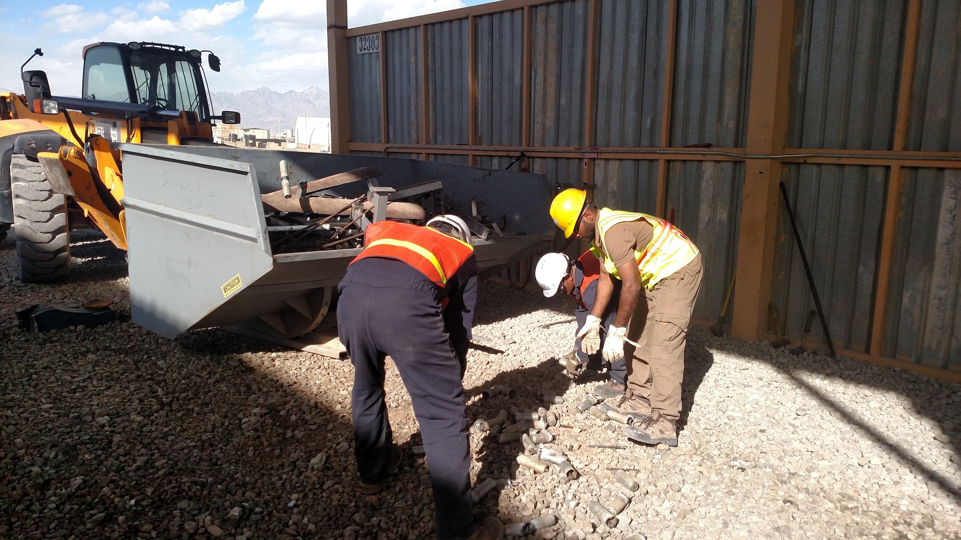 Personnel process property  property in a hopper, which eliminates the need for employees to manually move material to a disposal container.