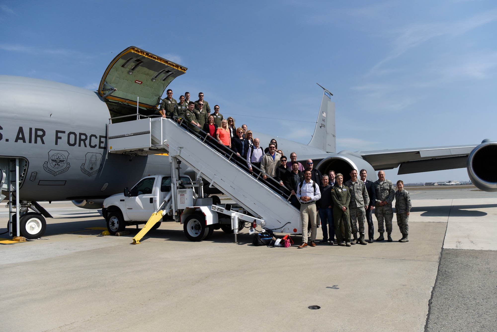 MacDill Air Force Base civic leaders and senior leadership pose alongside Team Dover’s commander and command chief before boarding their return flight March 29, 2018, at Dover AFB, Del. The group flew back to MacDill AFB on a KC-135 Stratotanker. (U.S. Air Force Photo by Airman 1st Class Zoe M. Wockenfuss)