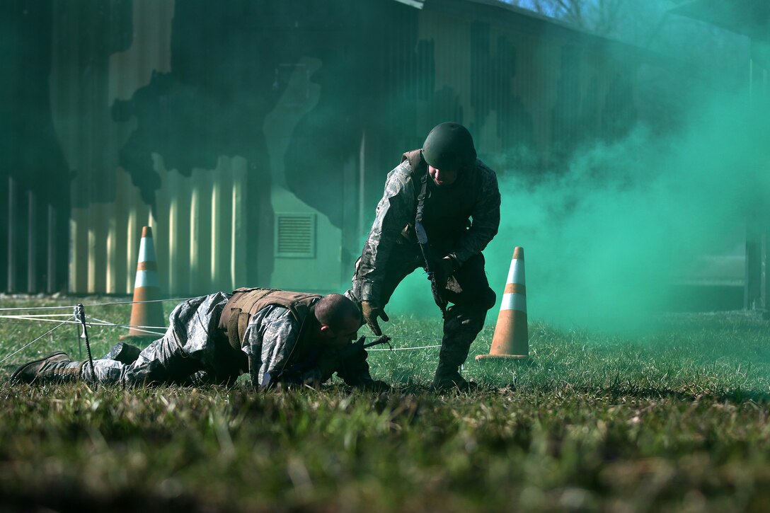 Members of the 445th Security Forces Squadron participate in the unit’s annual winter challenge March 2, 2018.