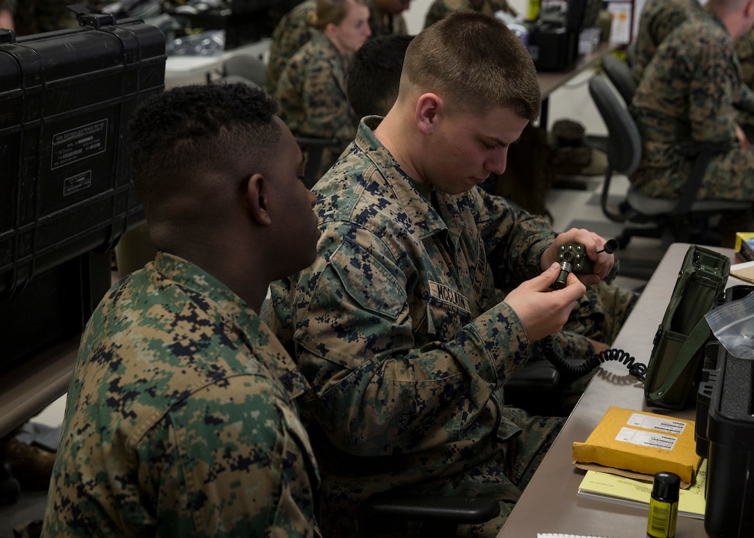Cpl. Curtis J. Davis and Lance Cpl. Jacob M. McClain, administrative specialists with 3rd Marine Aircraft Wing, inspect radiation equipment during the reconnaissance, surveillance and decontamination course at Marine Corps Air Station Miramar, Calif., March 25. The course is designed to train unit personnel in the procedures and equipment used in accomplishing RS&D operations in a chemical, biological, radiological or nuclear environment. (U.S. Marine Corps photo by Lance Cpl. Clare J. McIntire/released)