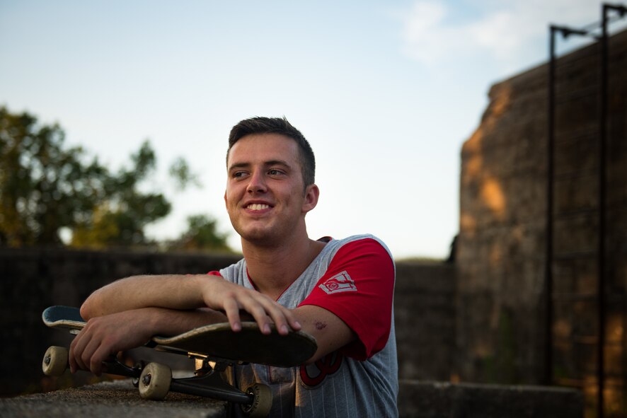 U.S. Air Force Airman 1st Class Nick Whitehurst, 633rd Communications Squadron client systems technician, rests after landing a nose-grab in Hampton, Va., July 25, 2017.