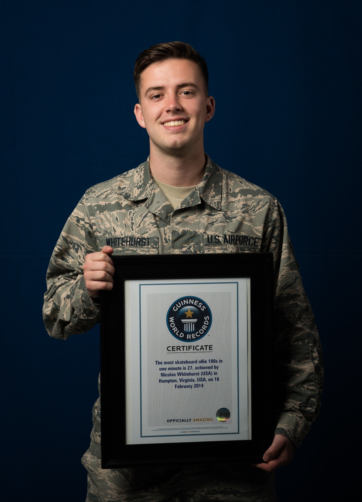 U.S. Air Force Airman 1st Class Nicholas Whitehurst, 633rd Communications Squadron client systems technician, holds his Guinness World Record certificate March 22, 2018, at Joint Base Langley-Eusits, Virginia.