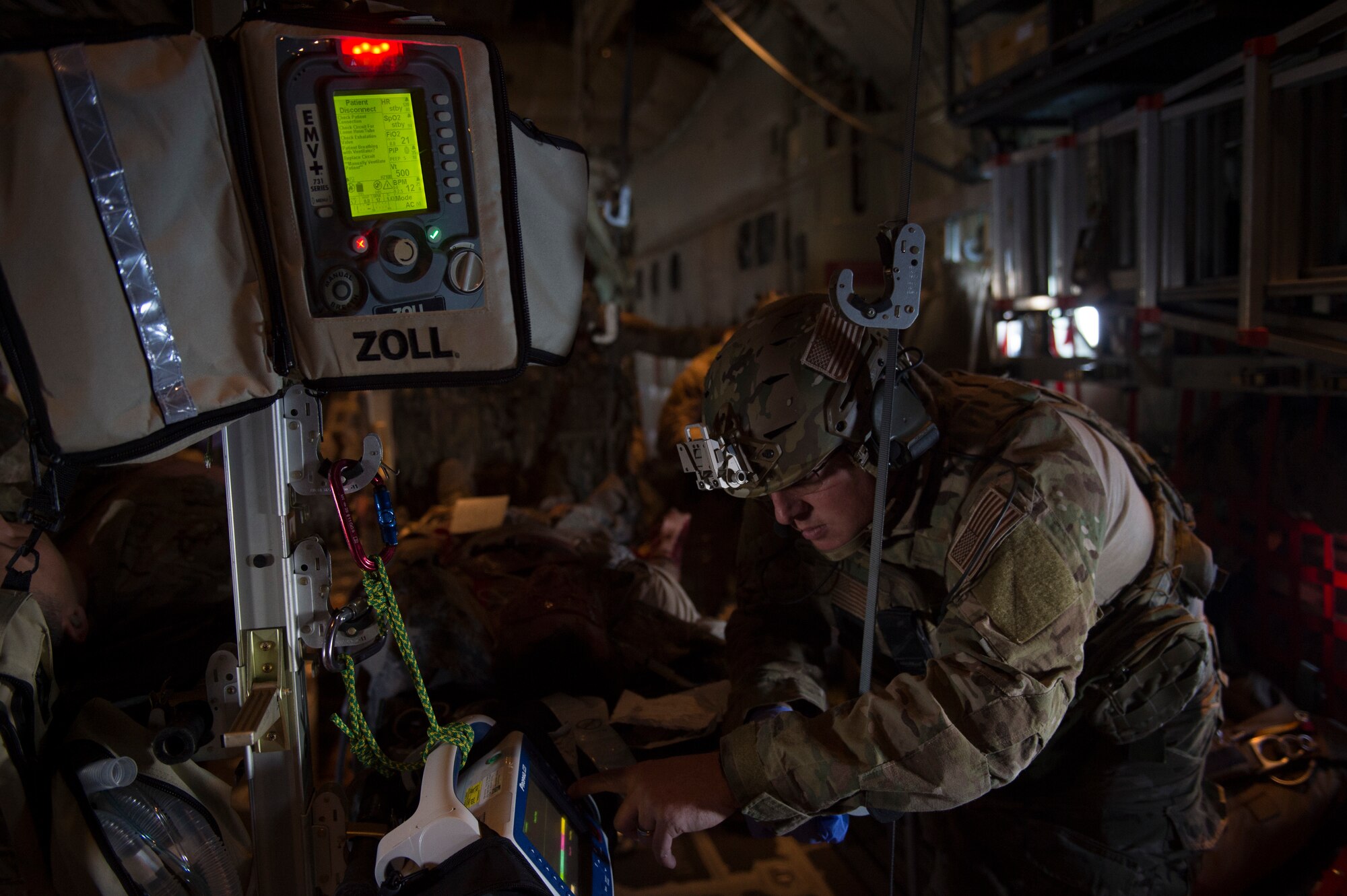 A pararescueman from the 58th Rescue Squadron, Nellis Air Force Base, Nev., provides care to a simulated casualty during Tiger Rescue IV, March 27, 2018, at Vandenberg Air Force Base, Calif. The four-day exercise challenged Airmen from multiple rescue squadrons to bring the capabilities of the personnel recovery triad together to successfully complete rescue missions and maintain proficiency. The three branches of the personnel recovery triad are the HC-130J Combat King II, HH-60G Pave Hawk and the guardian angel weapons system or pararescuemen. (U.S. Air Force photo by Senior Airman Janiqua P. Robinson)
