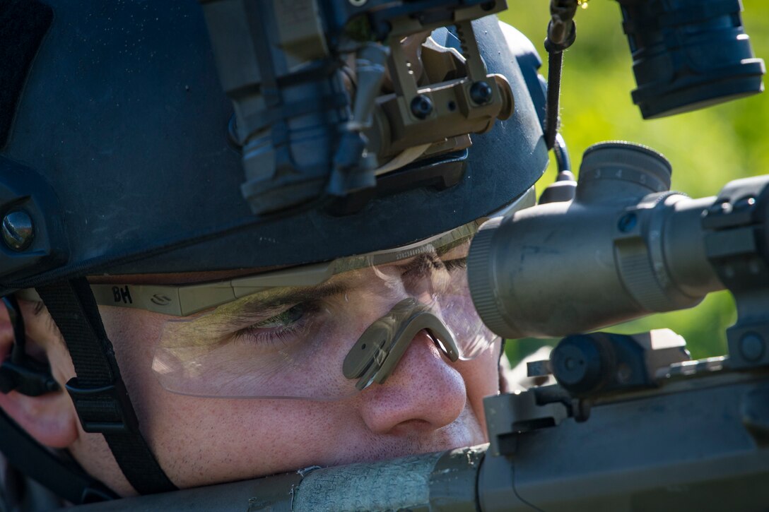 A pararescueman from the 58th Rescue Squadron, Nellis Air Force Base, Nev., focuses on a simulated hostile target during Tiger Rescue IV, March 28, 2018, at Vandenberg Air Force Base, Calif. The four-day exercise challenged Airmen from multiple rescue squadrons to bring the capabilities of the personnel recovery triad together to successfully complete rescue missions and maintain proficiency. The three branches of the personnel recovery triad are the HC-130J Combat King II, HH-60G Pave Hawk and the guardian angel weapons system or pararescuemen. (U.S. Air Force photo by Senior Airman Janiqua P. Robinson)
