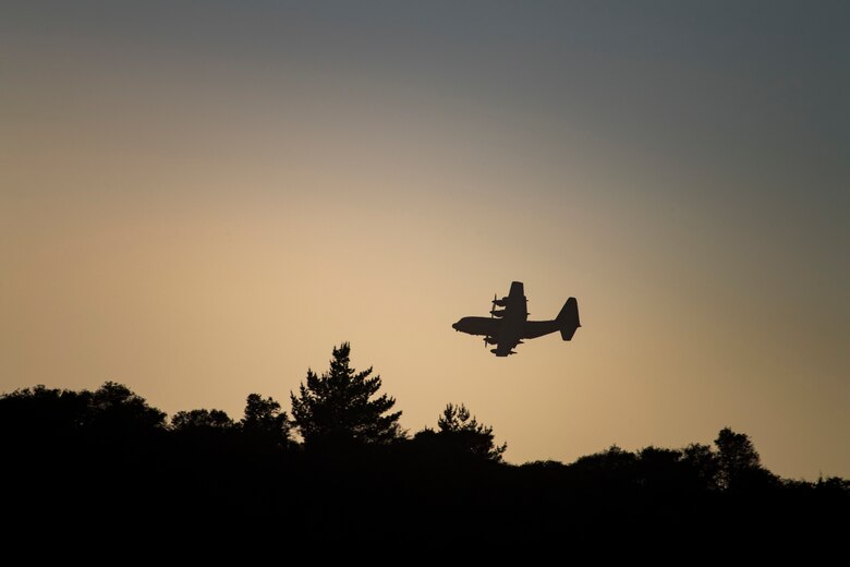An HC-130J Combat King II from the 71st Rescue Squadron, Moody Air Force Base, Ga., provides over watch during Tiger Rescue IV, March 28, 2018, at Vandenberg Air Force Base, Calif. The four-day exercise challenged Airmen from multiple rescue squadrons to bring the capabilities of the personnel recovery triad together to successfully complete rescue missions and maintain proficiency. The three branches of the personnel recovery triad are the HC-130J, HH-60G Pave Hawk and the guardian angel weapons system or pararescuemen. (U.S. Air Force photo by Senior Airman Janiqua P. Robinson)