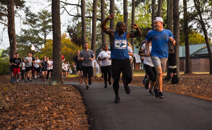 Participants in the Sexual Assault Awareness Prevention and Response color run begin the run at Joint Base Charleston, S.C., March 30, 2018.