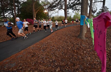 Participants in the Sexual Assault Awareness Prevention and Response color run begin the run at Joint Base Charleston, S.C., March 30, 2018.