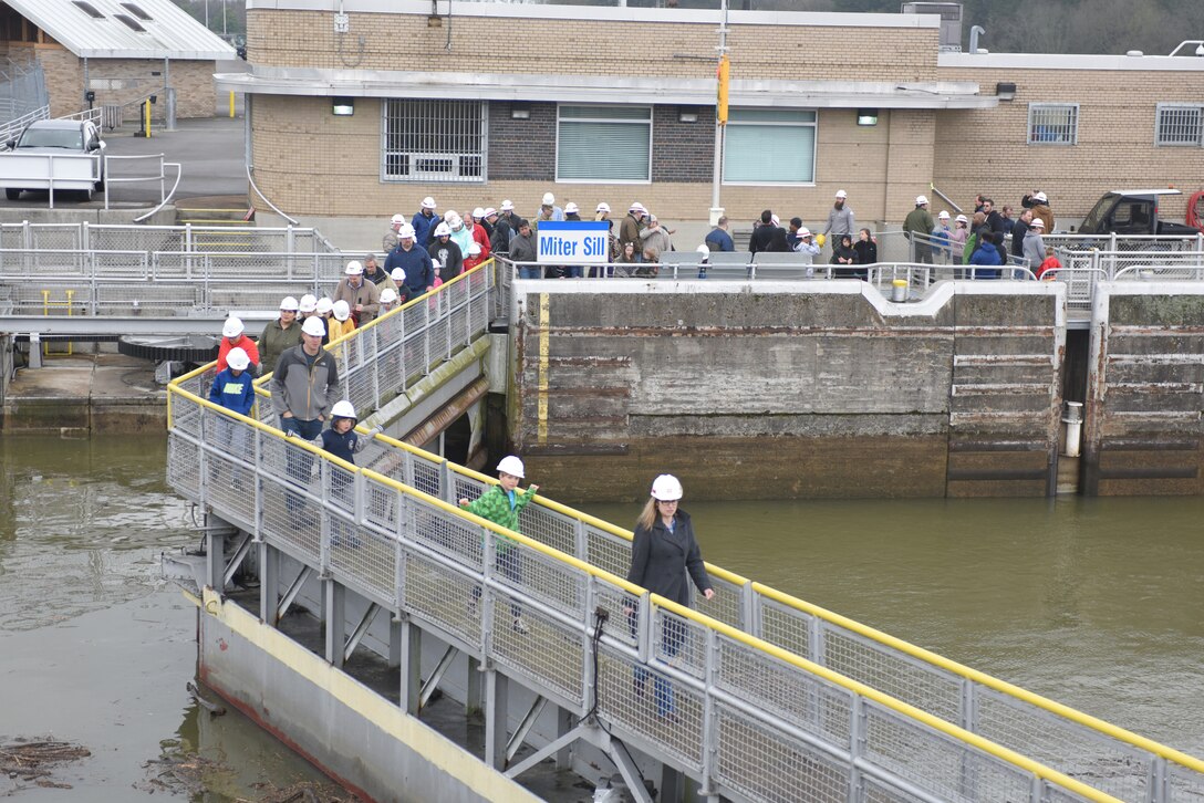 Parents and their children tour Old Hickory Lock during "Bring Your Kids to Work Day" in Old Hickory, Tenn., March 30, 2018. A total of 36 kids joined their parents for a tour of the dam, lock and power plant. (USACE Photo by Lee Roberts)