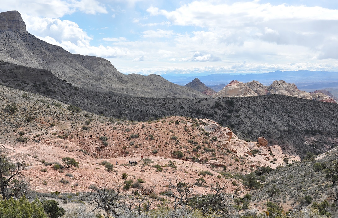 U.S. Army Corps of Engineers geologists and technicians from across the nation, seen in the distance, hike the Keystone Thrust Fault trail March 15 in the Red Rock Canyon National Conservation Area near Las Vegas.