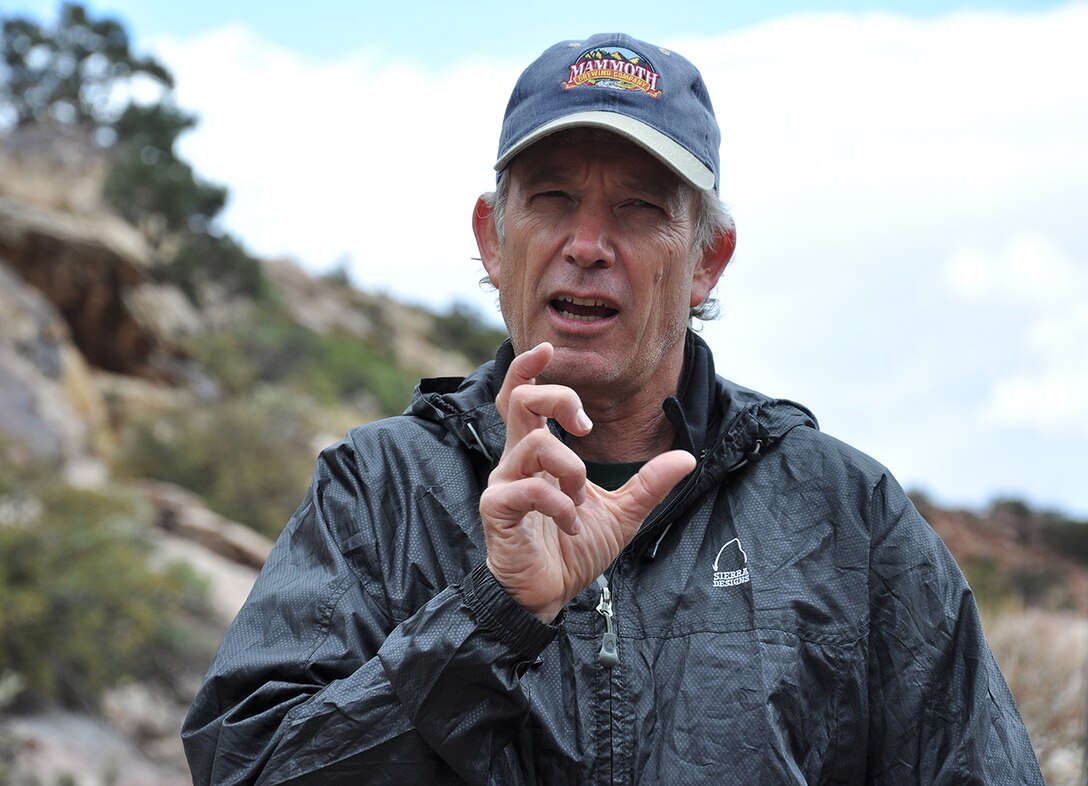 Keith Kelson, engineering geologist with the U.S. Army Corps of Engineers Sacramento District, provides an example to other U.S. Army Corps of Engineers geologists of how clues from pre-historic and historic floods can help predict future flooding events during an exercise March 15 at the Red Rock Canyon National Conservation Area near Las Vegas.