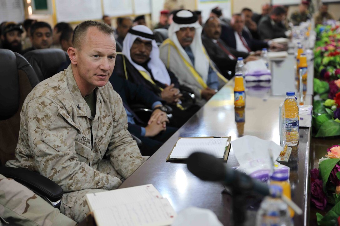 Marine Corps Col. Seth W. Folsom, assigned to Task Force Lion, and key Iraqi security forces leaders discuss regional security resolutions.