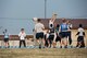A player intercepts a pass during an ultimate frisbee match, March 28, 2018, at Yokota Air Base, Japan.