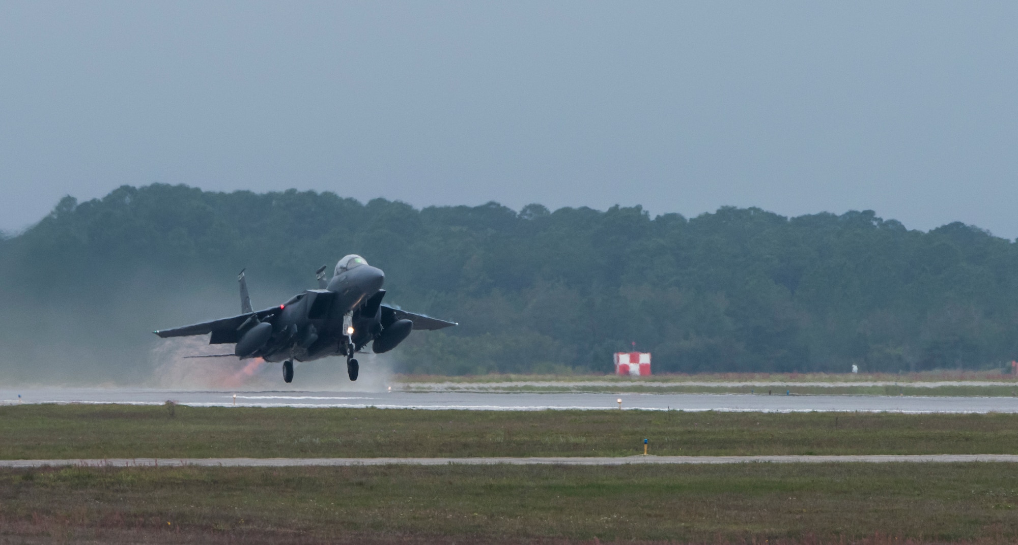 A 391st Fighter Squadron F-15E Strike Eagle takes off from Tyndall Air Force Base, Florida, during Combat Archer and Hammer April 2, 2018. Exercises Combat Archer and Hammer provide aircrew and maintainers the opportunity to evaluate their ability to employ a variety of different munitions.