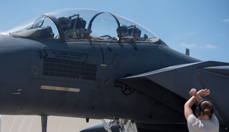Amn Tasha Trainor, 391st Aircraft Maintenance Unit crew chief, parks an F-15E Strike Eagle April 2, 2018 at Tyndall Air Force Base, Florida. Exercise Combat Archer and Hammer provide an opportunity to evaluate a unit's capability to employ a variety of weapon systems throughout all stages of the process, from storage and preparation, to use on target.