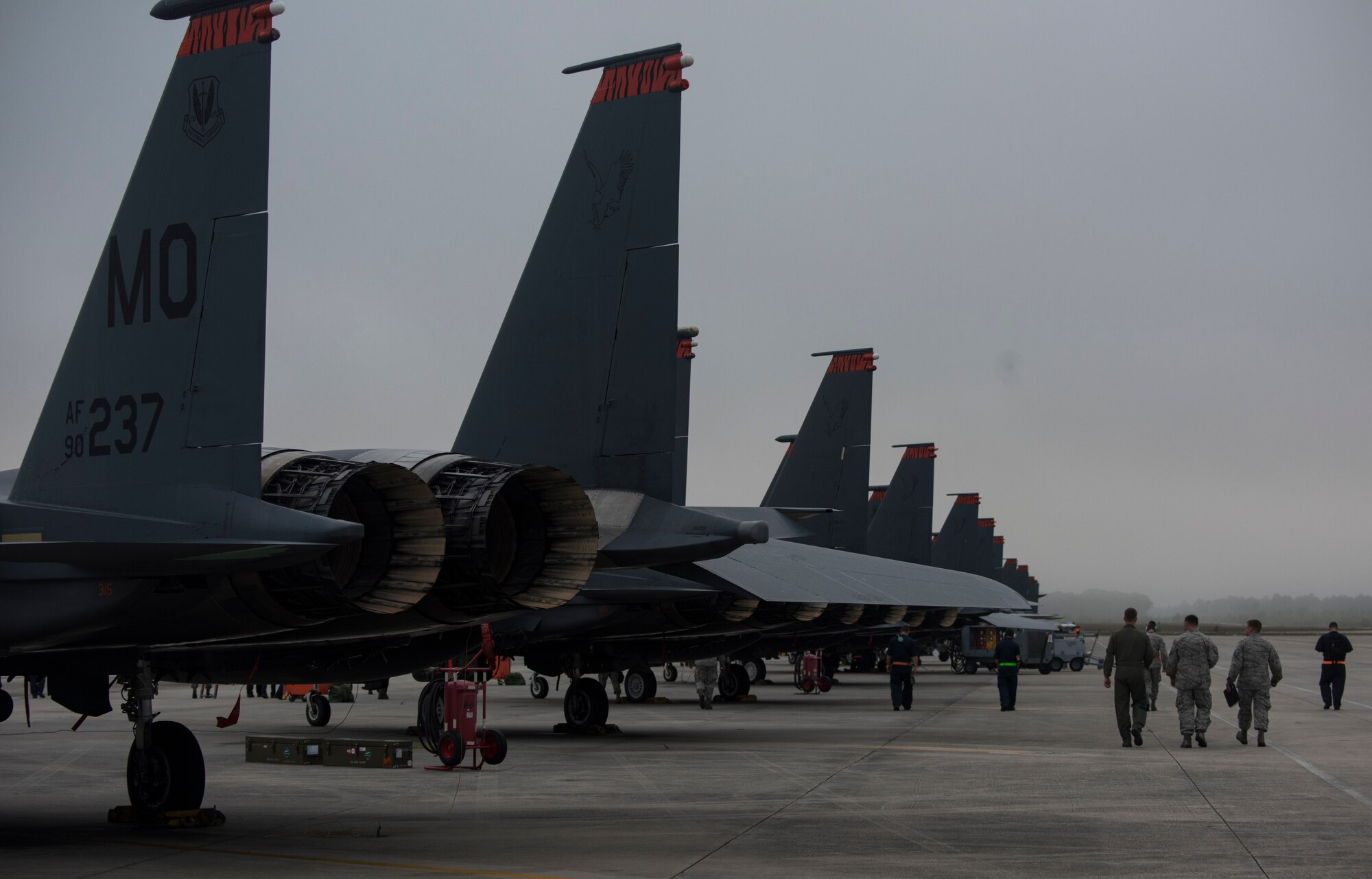 391st Fighter Squadron members perform a FOD walk before take-offs at Tyndall Air Force Base, Florida, April 3, 2018. The 391st FS participated in exercises Combat Archer and Hammer.