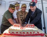 BENGKULU, Indonesia (April 2, 2018) United States and Indonesian government leaders use a cutless to make the ceremonial cake cut during the Pacific Partnership 2018 (PP18) opening ceremony reception aboard Military Sealift Command hospital ship USNS Mercy (T-AH 19) learn Indonesian cultural dances during the opening ceremony of the Indonesia mission stop of Pacific Partnership 2018.
