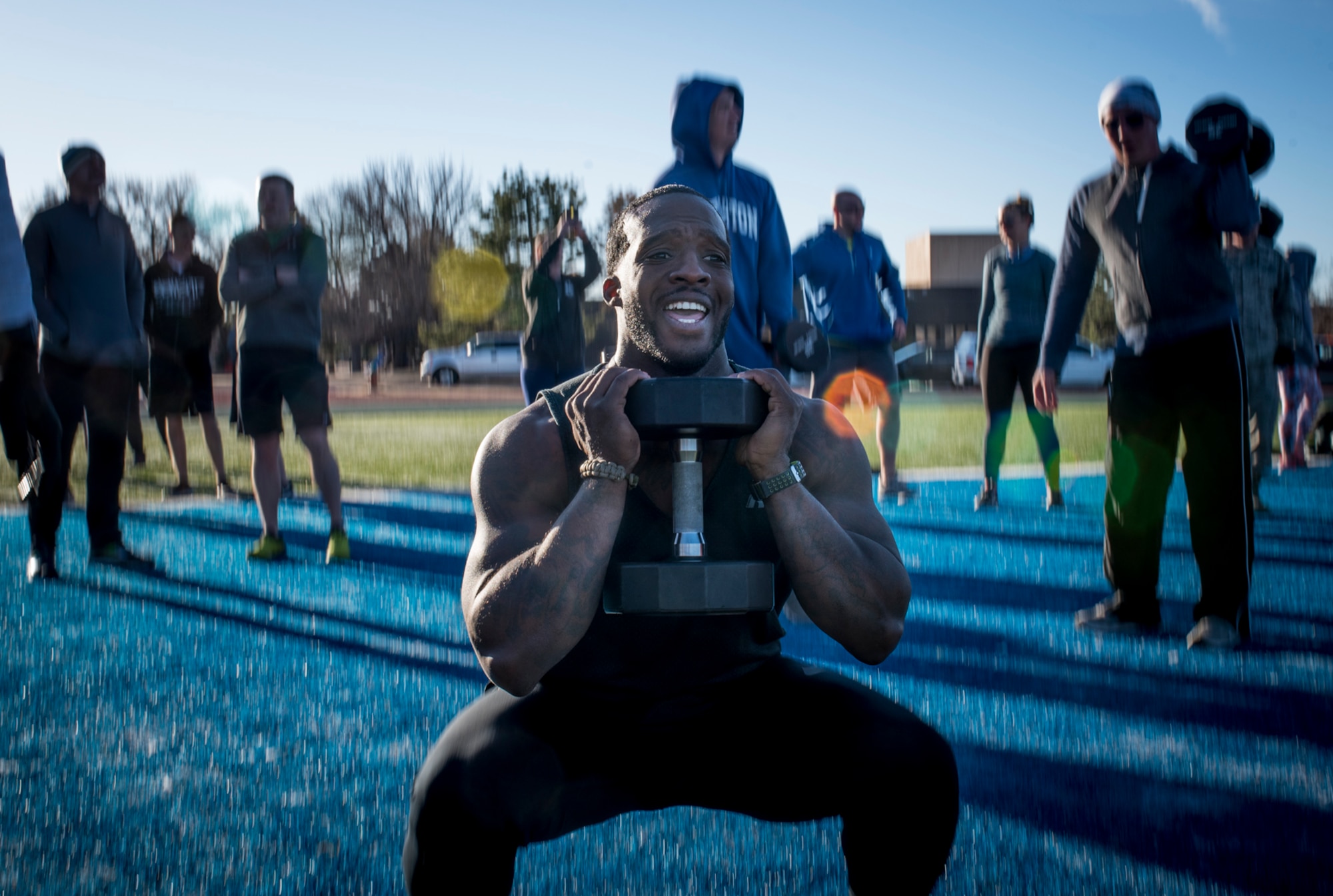 U.S. Air Force Staff Sgt. Maurice Hardy, 4th Space Control Squadron maintenance, works out in honor of Staff Sgt. Austin Bieren at Peterson Air Force Base, Colo., March 28, 2018. The workout was inspired by Bieren’s workouts and to honor and commemorate his death, which occurred March 28, 2017. (U.S. Air Force photo by Senior Airman Dennis Hoffman)