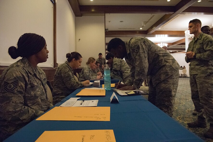 U.S. Airmen donate to the Air Force Assistance Fund campaign on Ramstein Air Base, Germany, March 26, 2018. The AFAF was established to raise funds annually for charitable affiliates that provide support to Air Force members and their families.