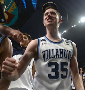 A Villanova Wildcats player celebrates his team's victory at the NCAA Division I men's basketball championship game at the Alamodome Monday, April 2, 2018.