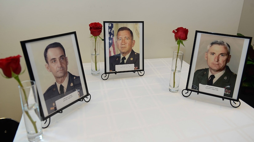 Photos of deceased former command sergeants major for U.S. Army Training and Doctrine Command are displayed during the TRADOC Command Sergeants Major Center of Excellence and Proponent Command Sergeants Major workshop at Joint Base Langley-Eustis, Va., March. 20, 2018.
