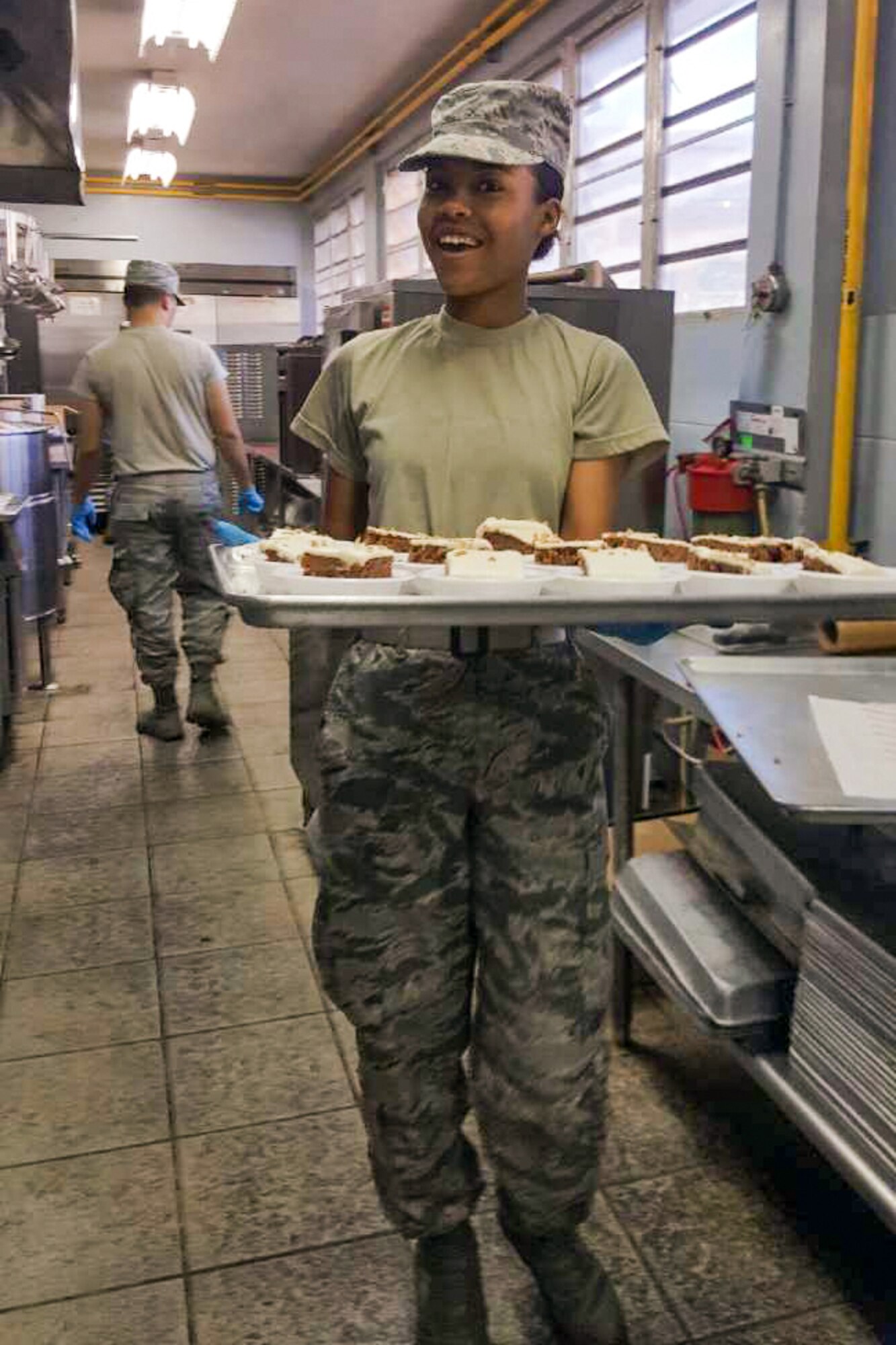 Airman 1st Class Starlyn Stratton preparing a desert tray during a 2017 deployment to Puerto Rico.