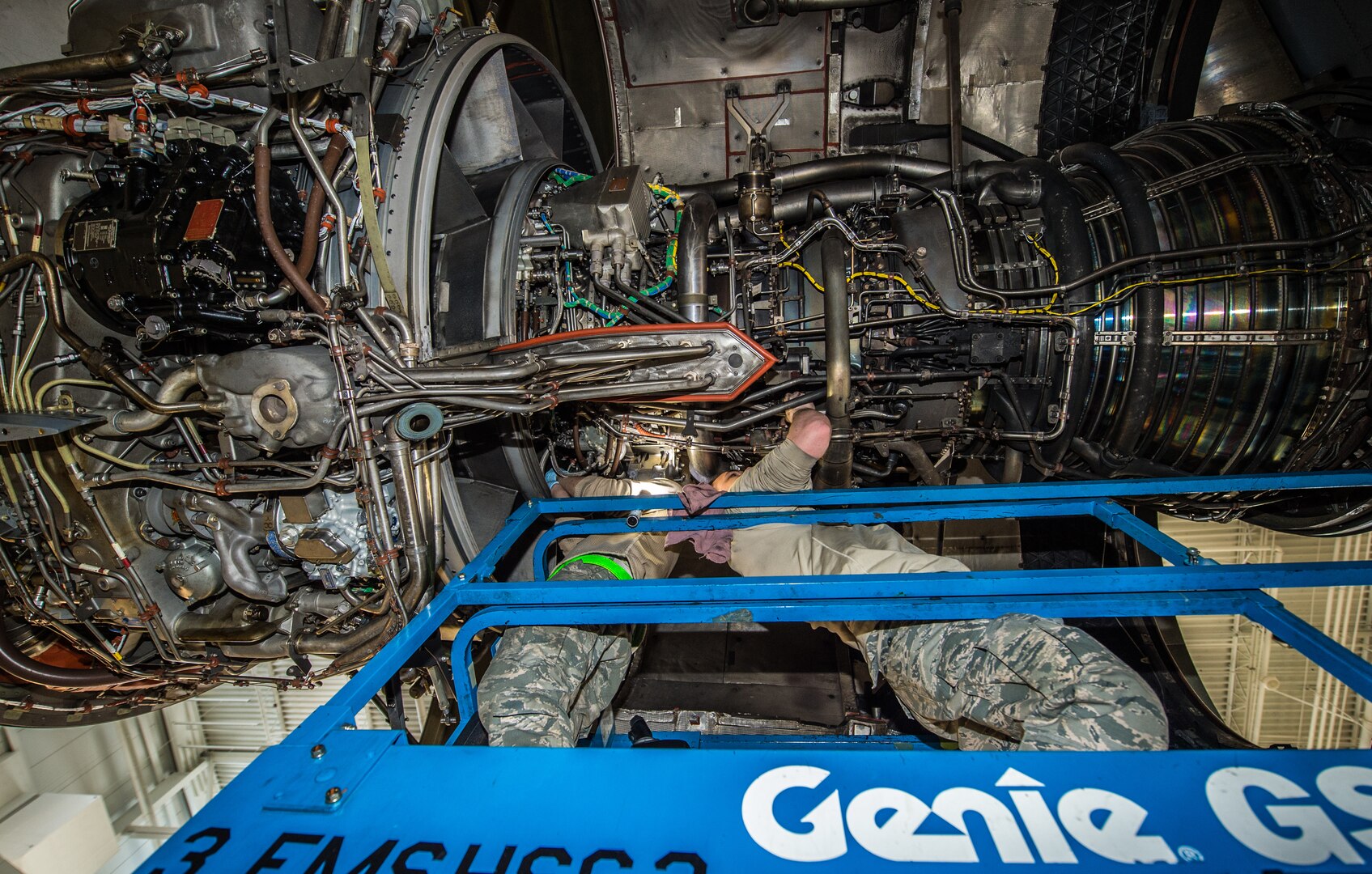 Senior Airman Austin Barbahm, 3rd Maintenance Squadron aerospace propulsion journeyman, and Airman 1st Class Adam Babcock, 3rd MXS aerospace propulsion apprentice, perform maintenance on a C-17 Globemaster III assigned to the 176th Wing during a home station check at Joint Base Elmendorf-Richardson, Alaska, March 27, 2018. The 3rd and 176th maintenance squadrons complete an in-depth, four-day scheduled inspection of a C-17 approximately every 180 days. A home station check is the behind-the-scenes maintenance that can prevent loss of life, lead to savings in time and money and keep the aircraft fit to fight.