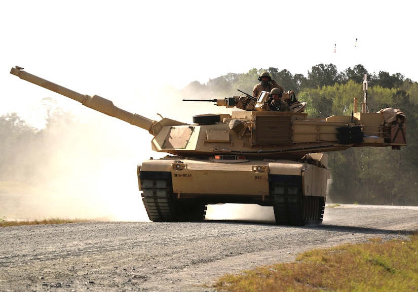 An M1A1-SA Abrams tank belonging to D Troop, 6th Squadron, 8th Cavalry Regiment, 2nd Armored Brigade Combat Team, 3rd Infantry Division, moves along the boundary road en route to its battle position during the gunnery qualification at Fort Stewart, Ga.