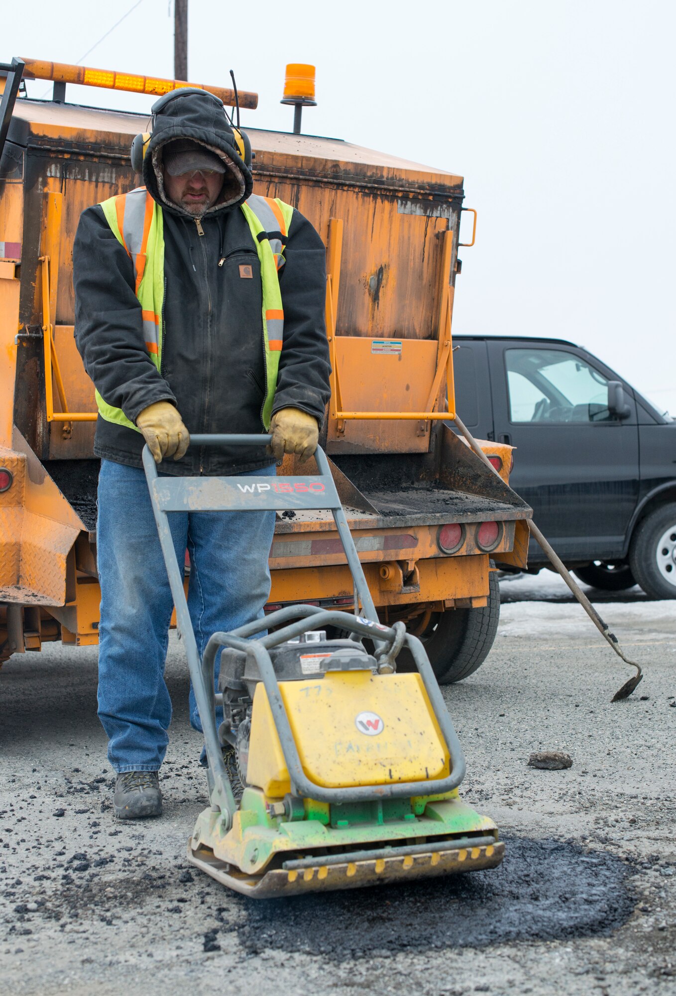 773rd Civil Engineer Squadron repairs potholes at JBER
