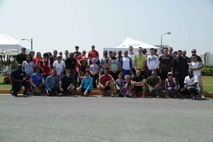 CAMP LESTER, OKINAWA, Japan – The runners and volunteers pose for a photo after the American Red Cross hosted Zombie Run March 31 aboard Camp Lester, Okinawa, Japan.