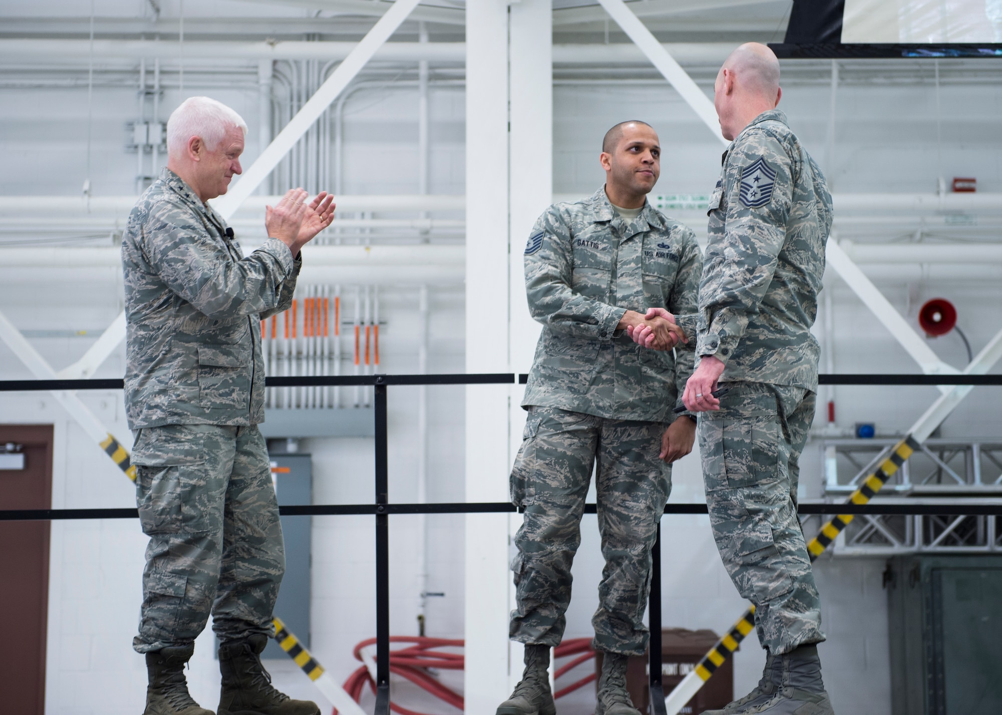 U.S. Air Force Tech. Sgt. Rodney Gattis, 133rd Force Support Squadron, is recognized and coined for earning recruiting and retention manager of the quarter in St. Paul, Minn., March 25, 2018.