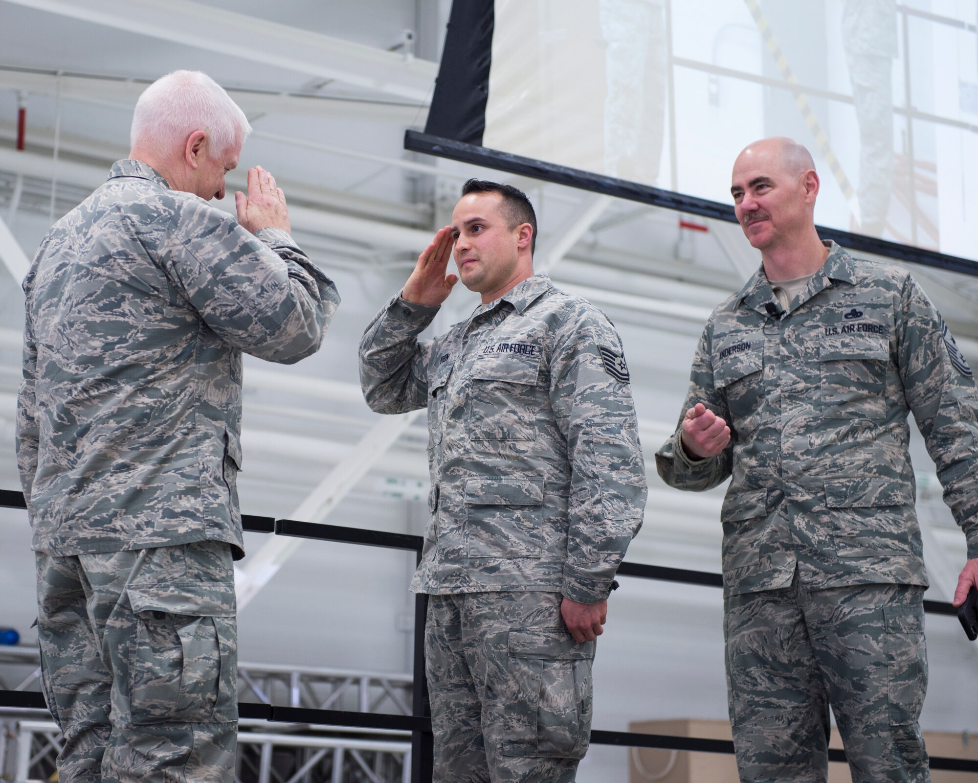 U.S. Air Force Tech. Sgt. Mark Pierson, 133rd Maintenance Group, is recognized and coined for volunteering to go on a short notice deployment in St. Paul, Minn., March 25, 2018.