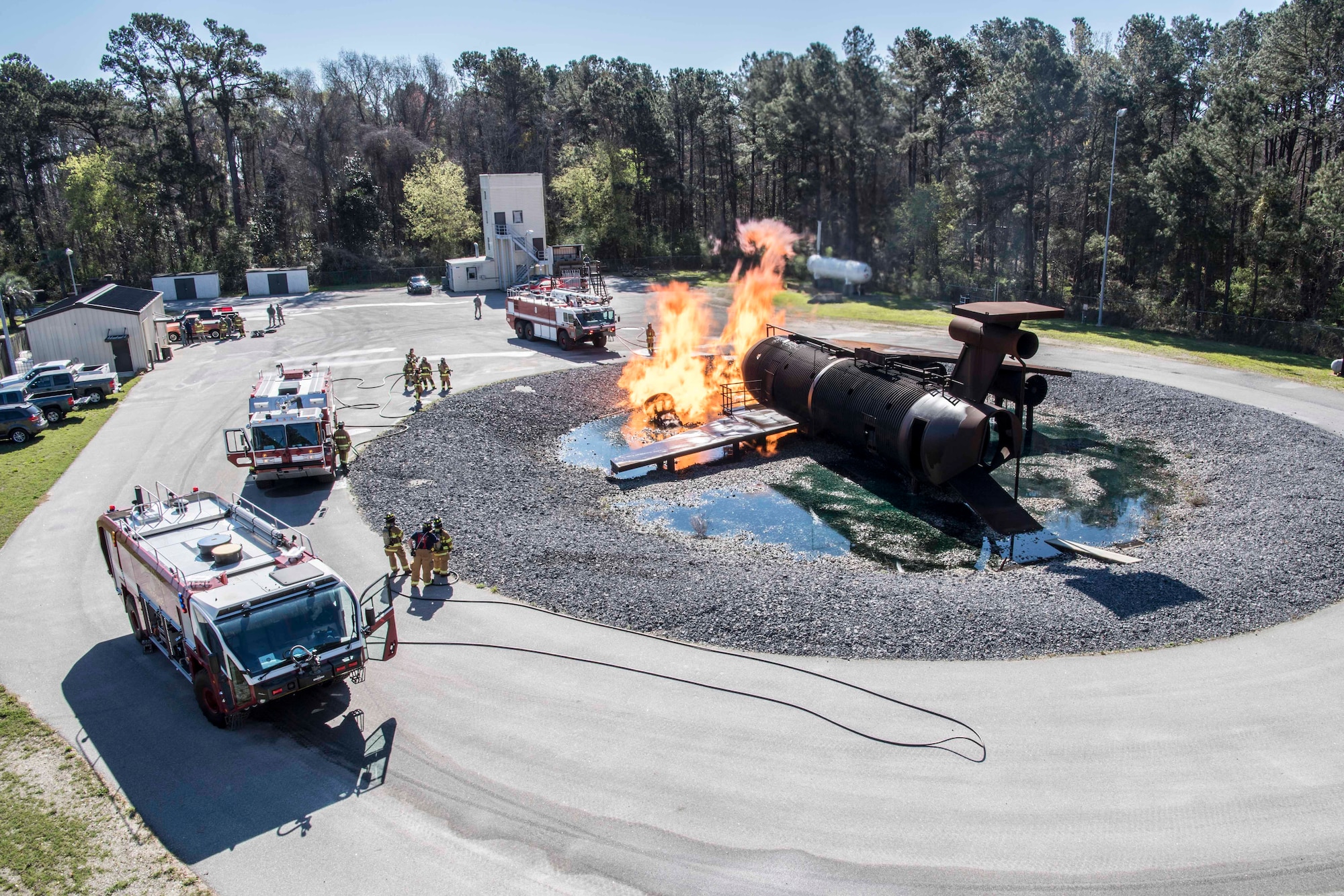 Reserve Firefighters Tackle the Aircraft Burn Trainer