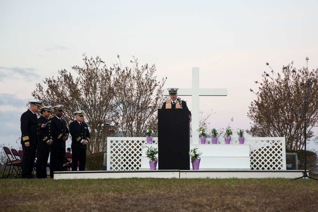 Navy Lt. j.g. Joseph Frana leads the Easter Sunrise Service in the first prayer of the morning on Marine Corps Base Camp Lejeune, April 1. The service was held in the morning as the sun rises to symbolize the rise of Christ. Frana is the chaplain for 10th Marine Regiment.