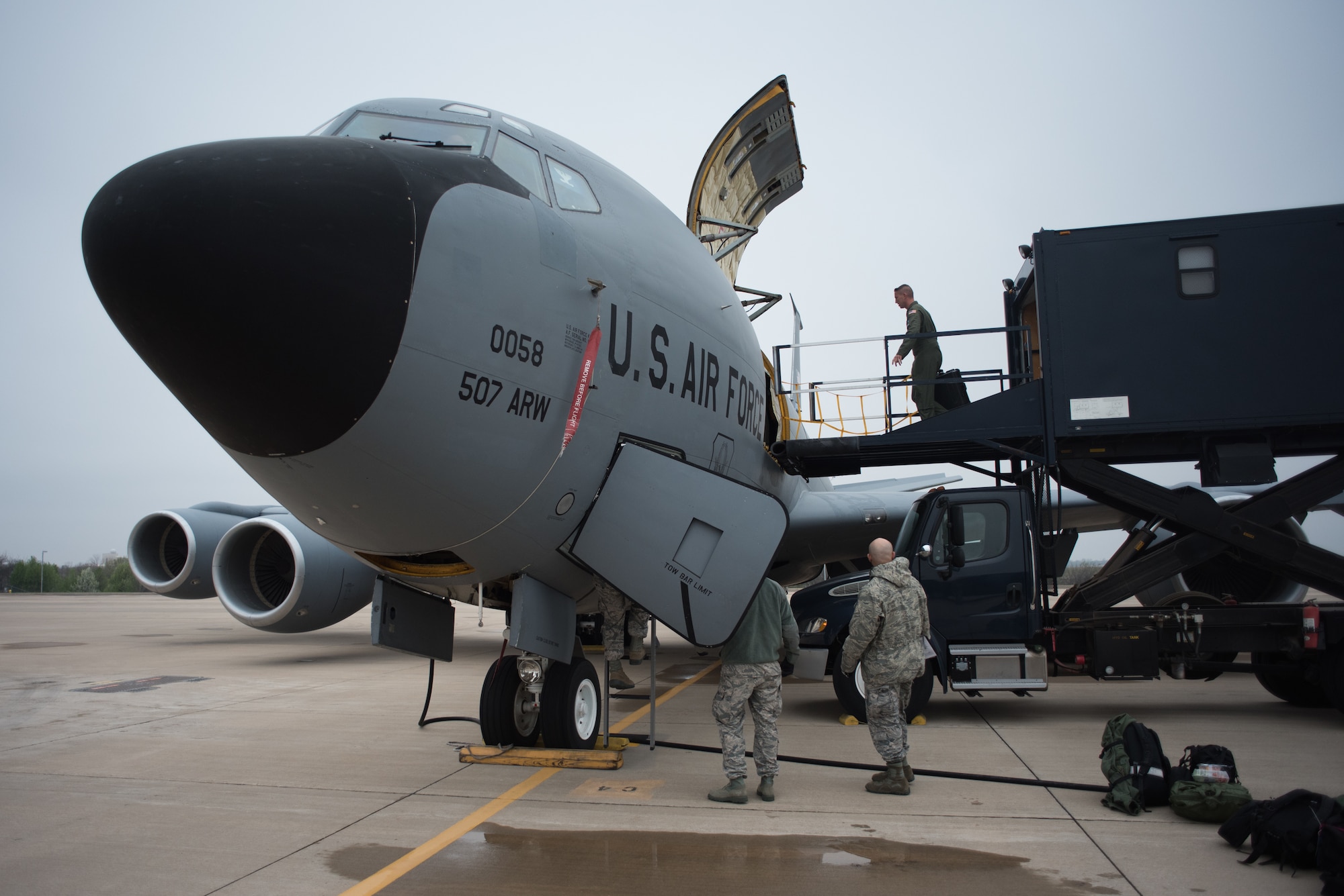 Aeromedical evacuation squadron members from five Air National Guard units load medical equipment on a KC-135 Stratotanker, from the 507th Air Refueling Wing, Tinker Air Force Base, Oklahoma, before completing in-flight training scenarios at Tinker Air Force Base near Oklahoma City, March 27, 2018. The Multiple Aircraft Training Opportunity Program (MATOP) was created by the 137th Aeromedical Evacuation Squadron from Will Rogers Air National Guard Base in Oklahoma City in 2012. (U.S. Air National Guard photo by Staff Sgt. Tyler Woodward)