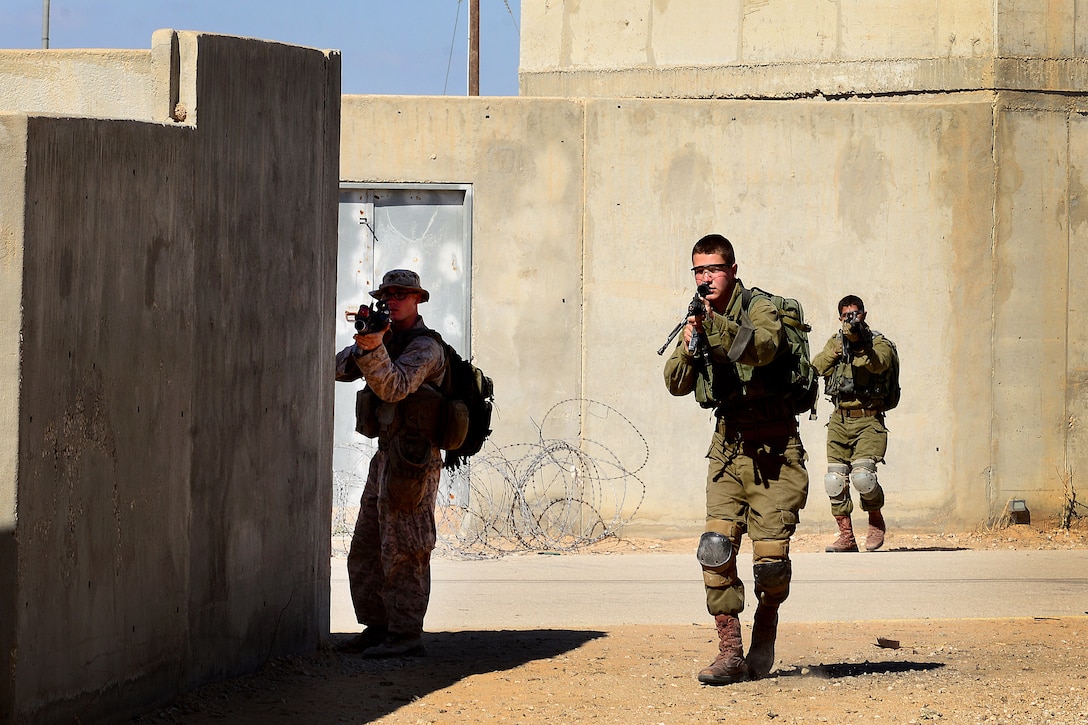 U.S Marines and Israeli soldiers conduct urban combat training.