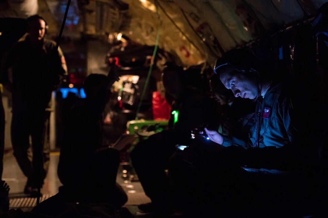 Senior Airman Gibson Zamarripa, an aeromedical evacuation technician from the 137th Aeromedical Evacuation Squadron, Oklahoma Air National Guard, reviews procedures on a tablet in-between training scenarios on a KC-135 Stratotanker, from the 507th Air Refueling Wing, Tinker Air Force Base, Oklahoma, during MATOP (Multiple Aircraft Training Opportunity Program), March 27, 2018. MATOP was organized by the 137th Aeromedical Evacuation Squadron at Will Rogers Air National Guard Base in Oklahoma City and was designed to provide aeromedical evacuation squadrons from across the U.S. a hands-on learning opportunity with the C-130 Hercules, KC-135 Stratotanker and C-17 Globemaster III. The flight brought together aeromedical evacuation units from California, West Virginia, North Carolina, Minnesota, Wyoming, Delaware, Mississippi, New York and Oklahoma. (U.S. Air National Guard photo by Staff Sgt. Tyler Woodward)