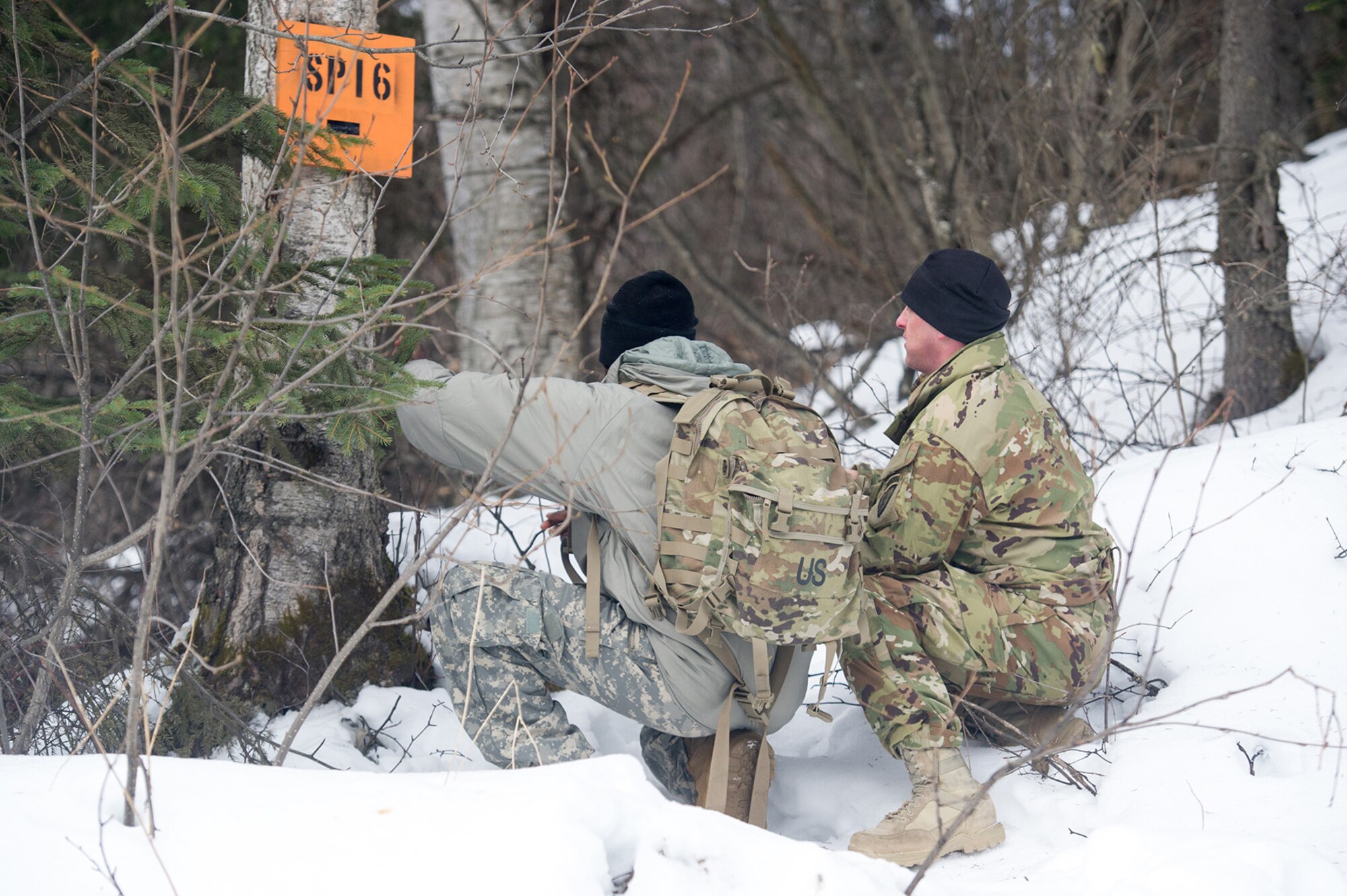 Paratroopers assigned to the 4th Infantry Brigade Combat Team (Airborne), 25th Infantry Division, U.S. Army Alaska, conduct a land navigation course on Joint Base Elmendorf-Richardson, Alaska, April 4, 2018.  The Soldiers used their skills to plot courses using a lensatic compass, protractor, and a 1:25,000 scale map to navigate to, and locate points using provided grid coordinates within a predetermined time.