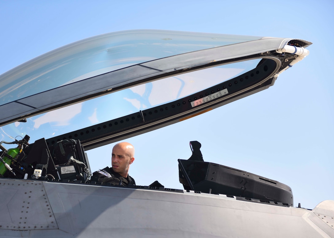 An Air Force F-22 fighter jet in flight.