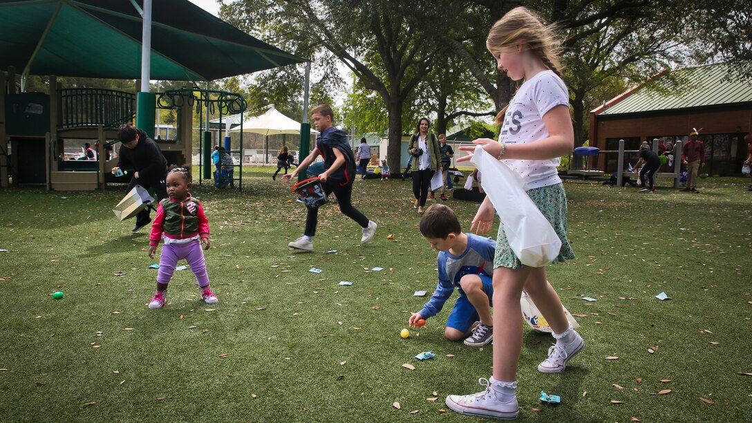 Children participate in an Easter egg hunt during Marine Corps Community Service’s annual ‘Eggstravaganza’ aboard Laurel Bay, March 31. The family oriented event was held to bring the families of the Tri-command together and celebrate the holiday. The ‘Eggstravaganza’ also offered arts & crafts and bounce houses.