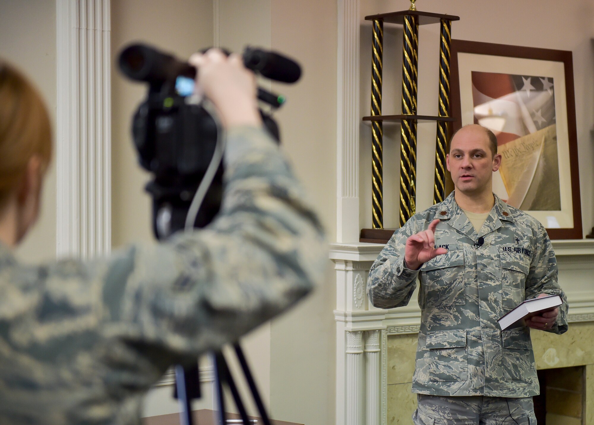Chaplain (Maj.) David Black, assigned to 910th Airlift Wing (AW), speaks on camera to produce a motivational message for Reserve Citizen Airmen here, April 5, 2018.