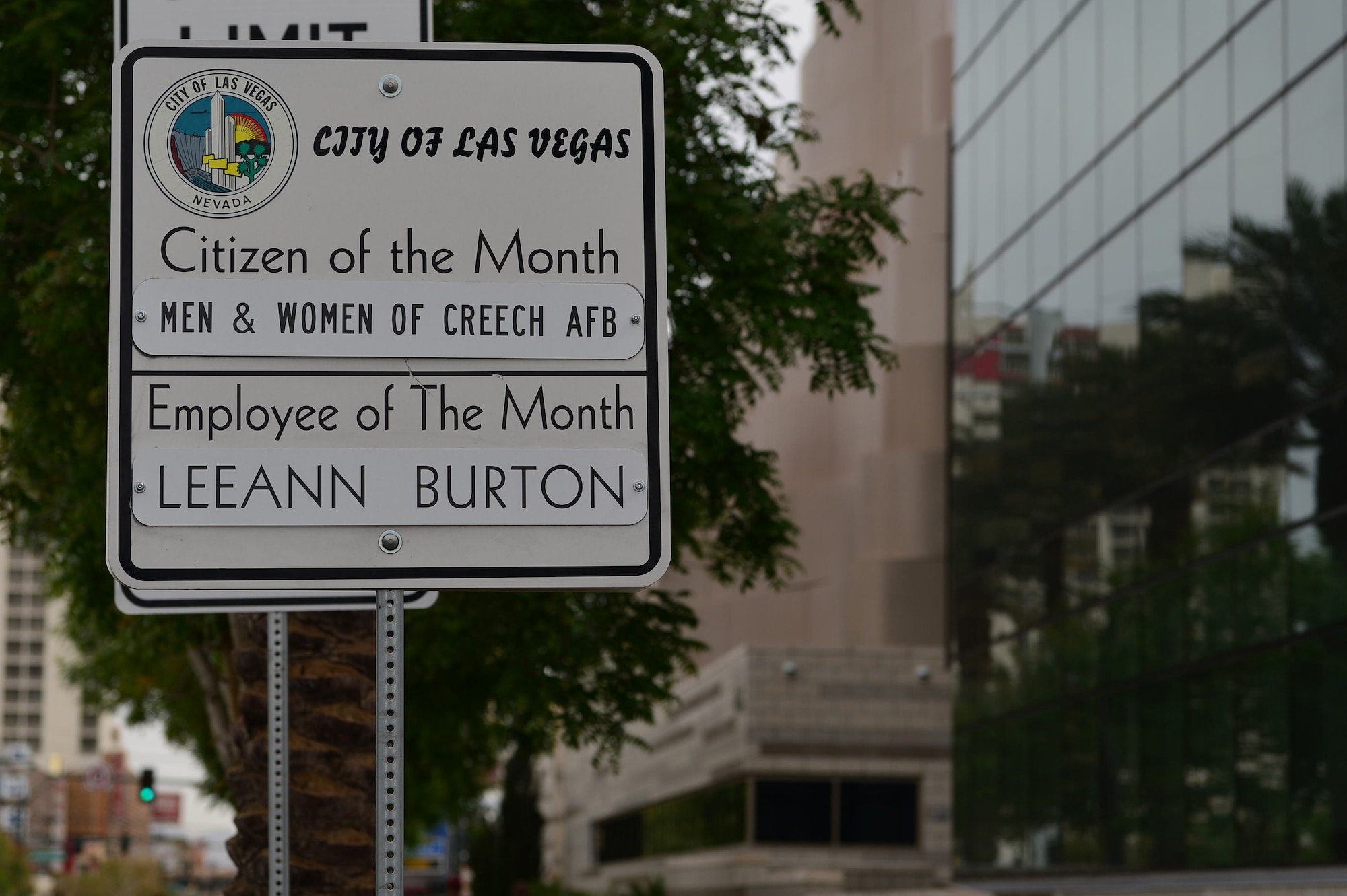 A sign is displayed outside the Las Vegas City Hall to recognize the Airmen of Creech Air Force Base as April’s citizens of the month, April 4, 2018. The men and women of Creech were nominated for their dedication, professionalism and their commitment to delivering justice to our nation’s enemies. (U.S. Air Force photo by Airman 1st Class Haley Stevens)