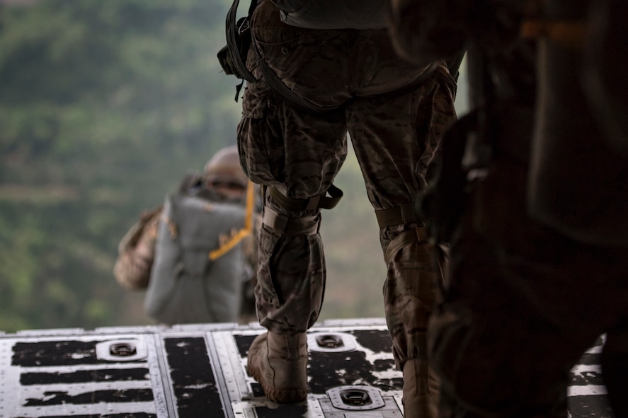 Airmen from the 820th Base Defense Group jump from an HC-130J Combat King II during static-line jump proficiency training, March 30, 2018, in the skies over Moody Air Force Base, Ga. The 820th BDG and the 71st RQS work together frequently so the defenders and the aircrew can maintain their qualifications. (U.S. Air Force photo by Staff Sgt. Ryan Callaghan)