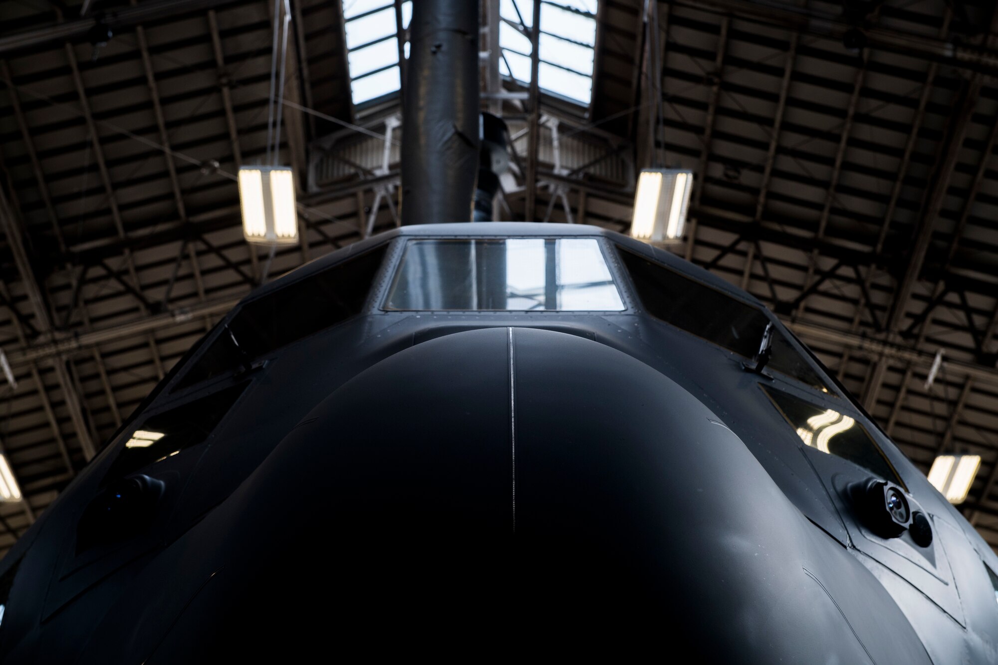 A C-130J Super Hercules sits parked in a hangar, Feb. 27, 2018, at Yokota Air Base, Japan.